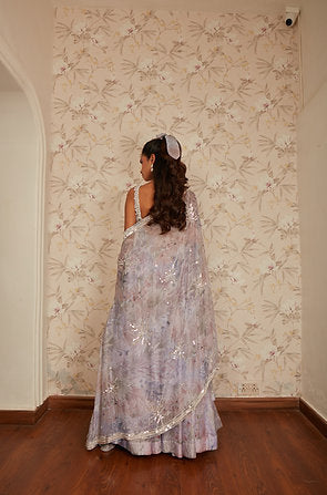 LILAC PRINT SKIRT WITH TASSEL BLOUSE AND CAPE