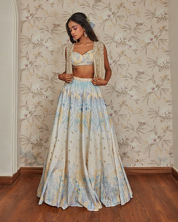 Yellow Print Skirt And Blouse With Tassel Vest
